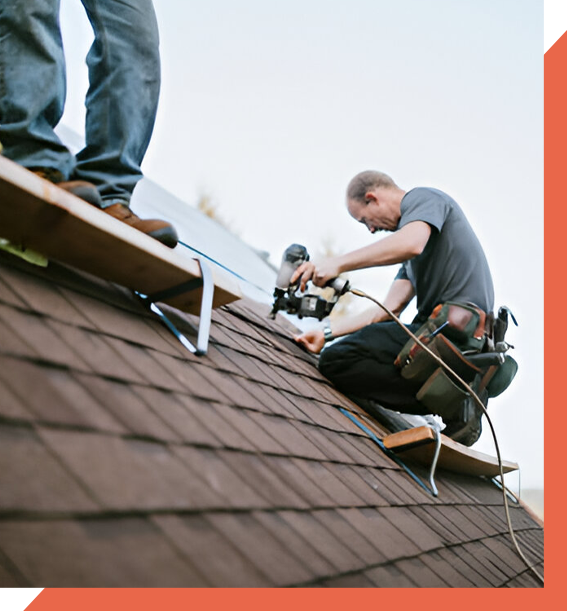 two cox bros roofers in greenville south carolina stapling roof shingles onto roof