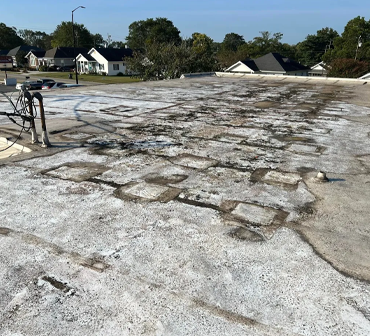 A commercial roof needing repair