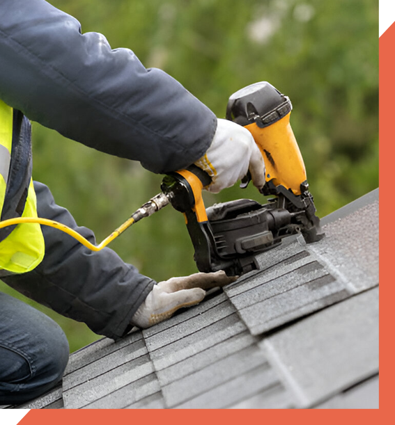 roofing technician stapling roof tiles in greenville south carolina