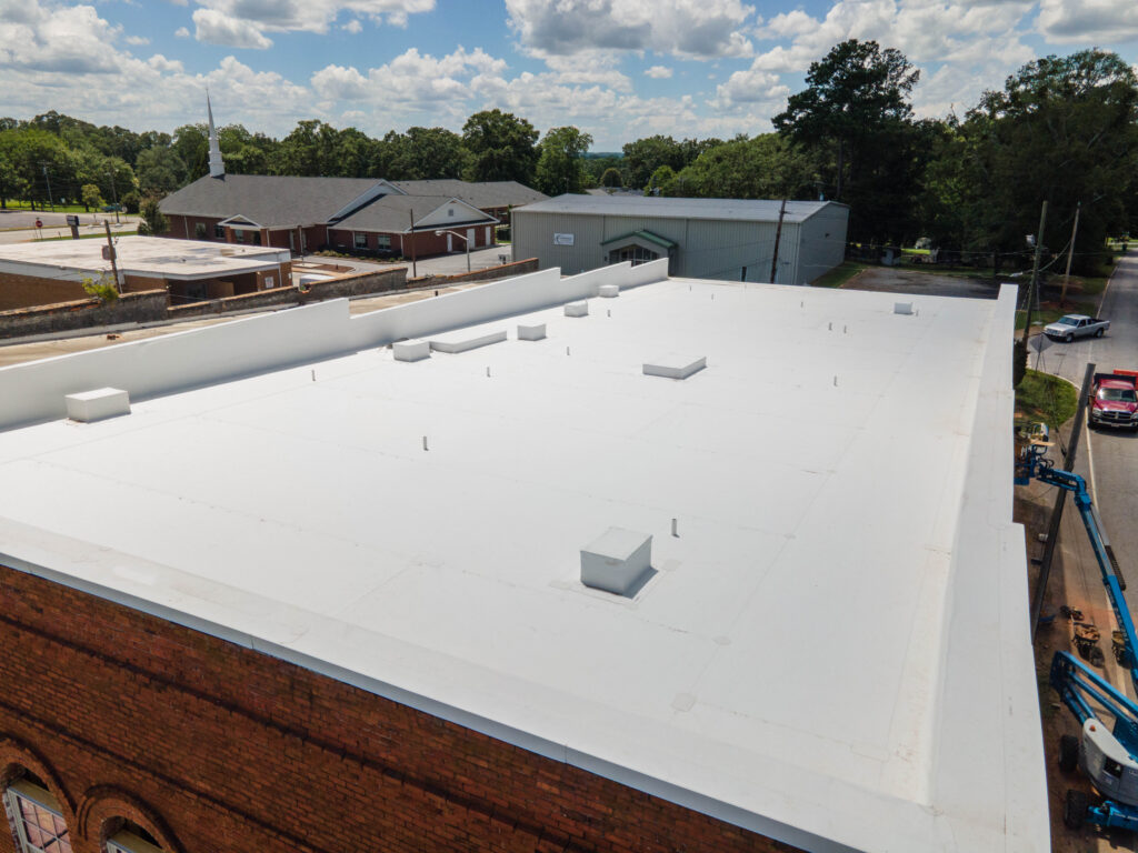 Flat roof installation completed by Cox Bros Roofing