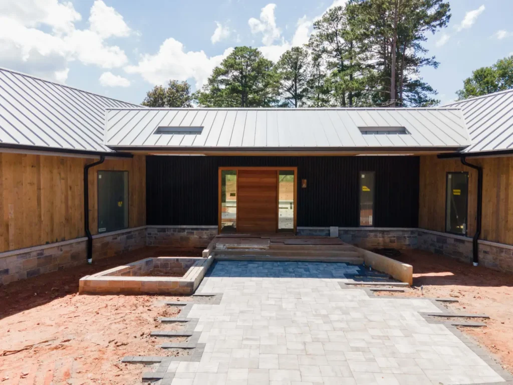A metal roof installed on a home by Cox Bros Roofing