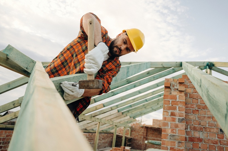 Roofer working on a roofing project