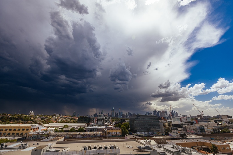 Storm clouds pictured over a city.